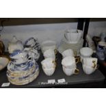 Royal Crown Derby twelve place fluted white tea set, the cups with gold handles