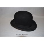 Moore's black bowler hat with leather and silk lining.