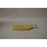 *A carved bone ornament in the form of a partly peeled banana, 14cm. (Lot Subject to VAT)