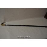 *A 19th Century Indian walking cane with horn handle, gold plated collar, 89cm. (Lot Subject to