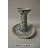 A Chinese blue and white candlestick with integral drip tray, 15cm high.