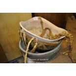 Two pottery hanging baskets and a large pottery bowl.