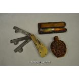 *Cheroot cigarette holder, vintage engineering tool and snuff bottle decorated with dragons (Lot