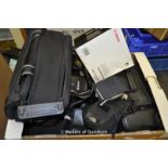 Box of empty camera cases