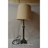 A tall brass column table lamp on stepped base, approx 66cm to top of fitting.