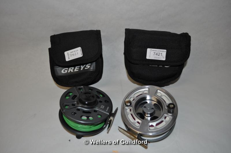 Greys GRX #718 and GTX no.3 fishing reels, both in soft cases.