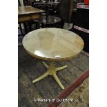 A cast iron quadruped pub table base with plywood and glass tops, 61.5cm diameter.