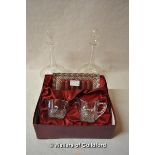 A pair of cut glass globular decanters; a boxed set of Edina crystal - tray, jug and sugar bowl.