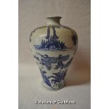 A Chinese blue and white baluster vase decorated with warriors, two blue rings to base, 34cm.