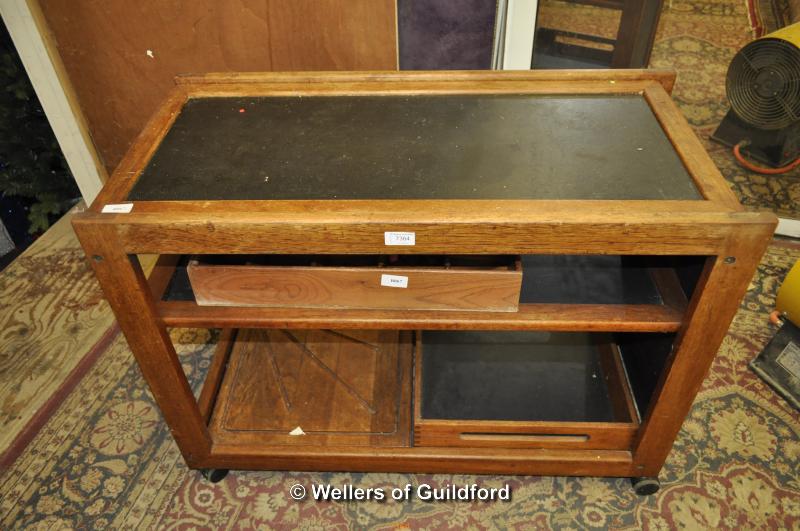 A late 20th Century teak serving trolley.