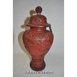 A Chinese cinnabar lacquer vase and cover, 25cm.