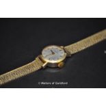 Garrard lady's 9ct gold dress watch with baton hour markers, cased.