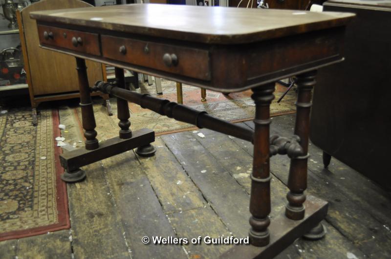 A Victorian mahogany side table with two frieze drawers and trestle end supports, 107 x 53cm.