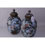 A pair of Chinese ovoid cloisonne vases and covers, pale blue ground decorated with birds amidst