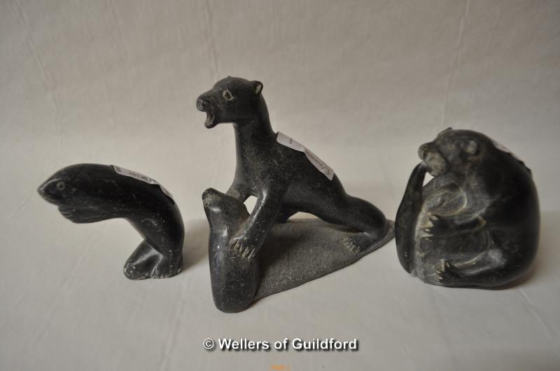 Three Inuit eskimo carvings; one of a bear catching a seal, 10.5cm, an otter eating a fish, 9cm, - Image 2 of 2