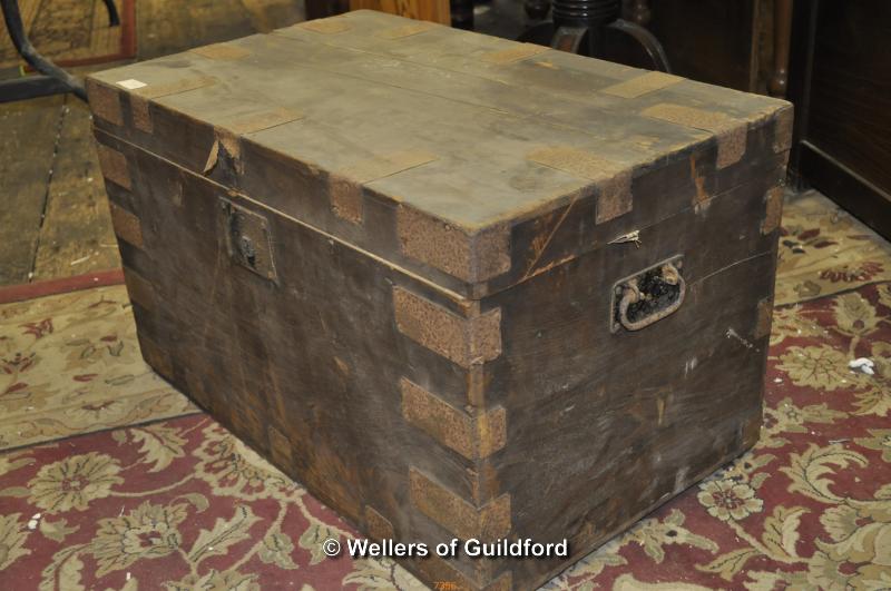 A pine and metal bound trunk, 68.5cm wide.