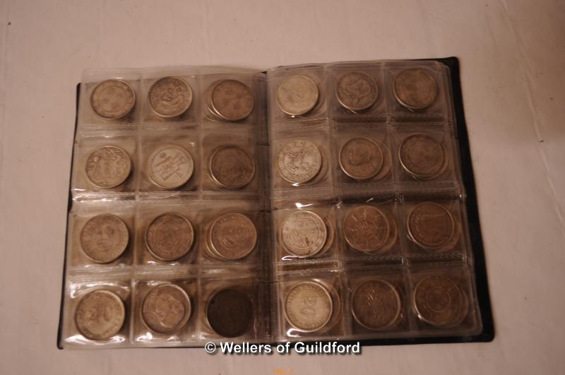 A collection of 108 Chinese coins in a booklet. - Image 3 of 3