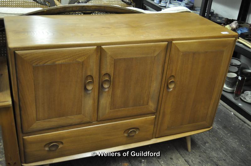 An Ercol sideboard, 114cm wide.