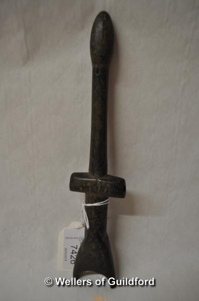 An Ivory Coast carved wooden whistle, 23cm. - Image 2 of 2