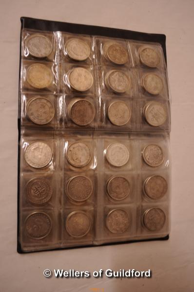 A collection of 108 Chinese coins in a booklet. - Image 2 of 3