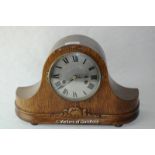 An oak Napoleon hat mantel clock with two train movement.