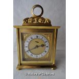 A Swiss made brass mantel clock with silvered chapter ring and Roman numerals, signed IM HOF.