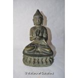 A Chinese iron figure of Buddha, 20cm.