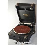 A Columbia portable wind up gramophone in black rexine case.