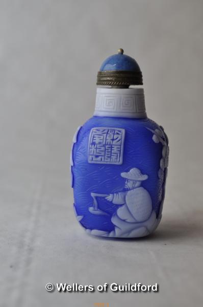 A Chinese blue and white cameo glass snuff bottle of square section. - Image 2 of 5