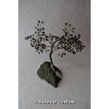 An ornamental tree with green hardstone leaves and malachite base, 25cms tall.