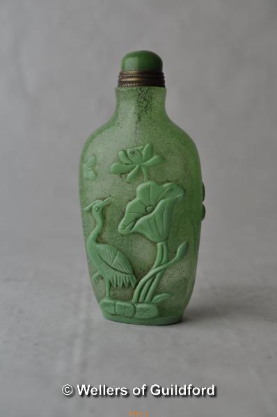 A Chinese green glass snuff bottle moulded with heron, birds and lotus flower. - Image 2 of 5