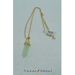 Jade pendant on golden chain