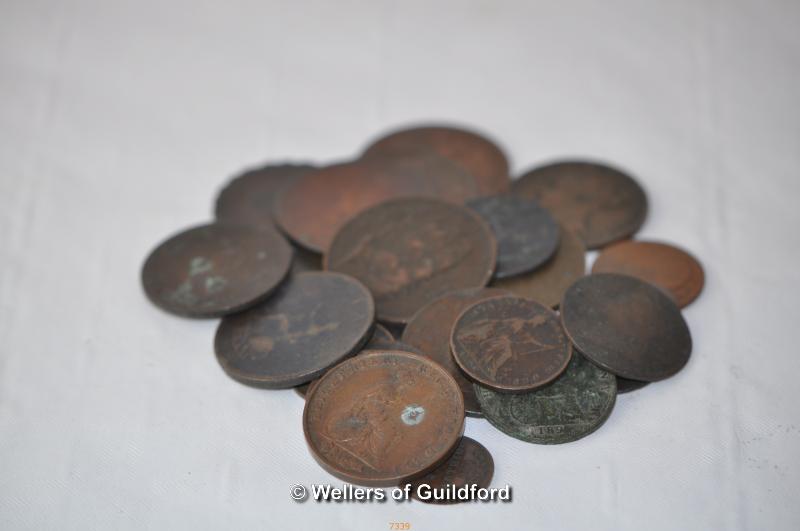 A group of old copper coins.