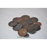 A group of old copper coins.