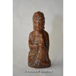 A small carved Chinese horn figure of a buddha, 7.5cm.