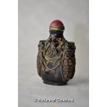 A Chinese horn snuff bottle carved with cicada.