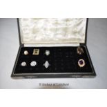 A collection of eight costume jewellery rings including a 9ct gold ring, two cubic zircona