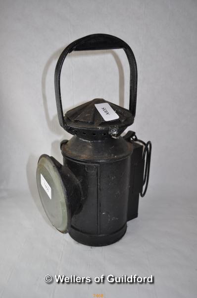 A black tin lamp, 32cm.