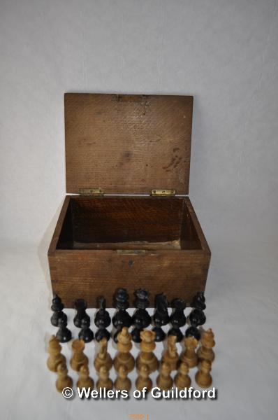 An ebonised and boxwood Staunton pattern chess set, height of king 6.5cm; an old oak box. - Image 2 of 3