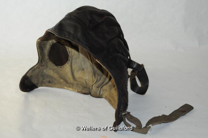 A vintage leather flying hat.