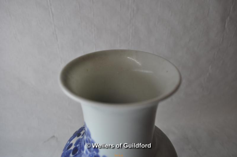 A Chinese blue and white vase decorated with children playing in a garden, 24cm. - Image 4 of 5