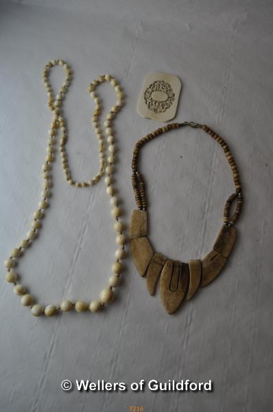 *Ivory graduated necklace, delicately carved plaque and bone necklace (Lot subject to VAT)