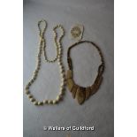 *Ivory graduated necklace, delicately carved plaque and bone necklace (Lot subject to VAT)