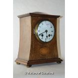 An Edwardian inlaid mahogany mantel clock, the white enamel dial with two train movement, striking