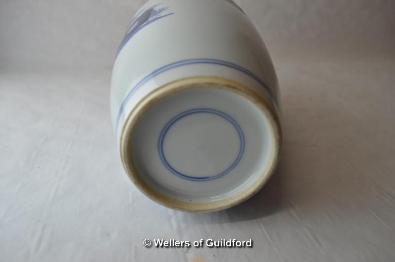 A Chinese blue and white vase decorated with children playing in a garden, 24cm. - Image 5 of 5