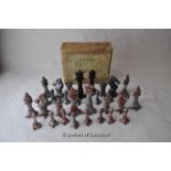 The Rose, a small cast metal chess set, height of king 6cm, in original box, much loss of paint.