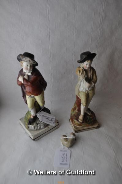Two Staffordshire pottery figures, extensive damage.