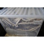 *Two plastic crates containing bedspread, modern fabric samples, etc.