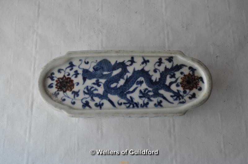 A Chinese blue and white paperweight decorated with a dragon, 13cm long. - Image 2 of 4