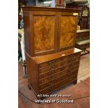 EARLY 20TH CENTURY FIGURED WALNUT CABINET WITH TWO PANELLED DOORS ENCLOSING PIGEON HOLES AND DRAWERS